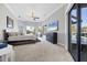 Main bedroom with private access to pool area and water views at 504 Mast Dr, Bradenton, FL 34208