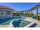 Relaxing pool and spa area with pergola at 504 Mast Dr, Bradenton, FL 34208