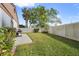 Large backyard with patio and fenced area at 5111 26Th St. Ct, W # 53, Bradenton, FL 34207