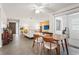 Dining area featuring tile floors and a dining table with four chairs at 5111 26Th St. Ct, W # 53, Bradenton, FL 34207