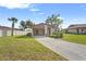 Front view of house with carport and lawn at 5111 26Th St. Ct, W # 53, Bradenton, FL 34207