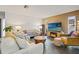 Cozy living room featuring tile floors, neutral walls, and comfortable seating arrangements at 5111 26Th St. Ct, W # 53, Bradenton, FL 34207