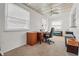 Office featuring a ceiling fan, a desk, and a carpeted floor at 5111 26Th St. Ct, W # 53, Bradenton, FL 34207