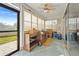 Sunroom featuring multiple windows and a door to the exterior at 5111 26Th St. Ct, W # 53, Bradenton, FL 34207