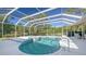 Sparkling pool with spa, surrounded by lush landscaping at 6641 Saint James Xing, University Park, FL 34201