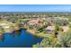 Luxury homes surround a lake and golf course in this scenic community at 7443 Riviera Cv, Lakewood Ranch, FL 34202