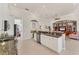 Spacious kitchen with granite countertops, stainless steel appliances, and white cabinetry at 7443 Riviera Cv, Lakewood Ranch, FL 34202