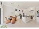 Modern kitchen with white cabinets, stainless steel appliances and breakfast nook at 7443 Riviera Cv, Lakewood Ranch, FL 34202