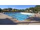 Community lap pool with lanes and shade at 7443 Riviera Cv, Lakewood Ranch, FL 34202