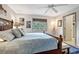 Relaxing main bedroom with a king-size bed and access to the bathroom at 77 Sandy Hook N Rd, Sarasota, FL 34242