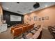 Community theater room with comfortable seating and projector at 8369 Wingate Dr # 2114, Sarasota, FL 34238