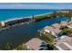 Aerial view of waterfront homes and waterway at 9122 Midnight Pass Rd # 33, Sarasota, FL 34242