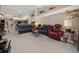 Open living room with high ceilings and views of the kitchen at 9443 Burnam Dr, Weeki Wachee, FL 34613