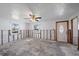 A living room undergoing renovations, showing exposed walls and flooring at 1005 Hines Ave, Sarasota, FL 34237