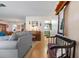 View of the living room, hallway and entryway bench, leading towards the kitchen at 1121 Danny Dr, Sarasota, FL 34243