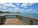 Enjoy breathtaking waterfront views from this deck at 1155 Tahiti Pkwy, Sarasota, FL 34236