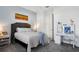 Bedroom with built-in desk and en-suite bathroom at 13126 Indigo Way, Bradenton, FL 34211