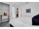 Bright bedroom with walk-in closet and view of living area at 13126 Indigo Way, Bradenton, FL 34211