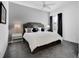 Cozy bedroom with a king-size bed and grey carpet at 13126 Indigo Way, Bradenton, FL 34211