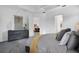 Bedroom with a queen-size bed and access to the living room at 13126 Indigo Way, Bradenton, FL 34211