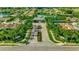Aerial view of community with houses and lake at 13126 Indigo Way, Bradenton, FL 34211