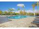 Resort-style pool with lounge chairs and umbrellas at 13126 Indigo Way, Bradenton, FL 34211