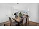 Bright dining room features a wood table with seating for six at 13126 Indigo Way, Bradenton, FL 34211
