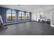 Exercise room with large windows and equipment at 13126 Indigo Way, Bradenton, FL 34211