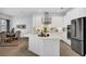 Spacious kitchen with an island and stainless steel appliances at 13126 Indigo Way, Bradenton, FL 34211
