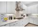 Sleek kitchen with white cabinets, stainless steel appliances and gas cooktop at 13126 Indigo Way, Bradenton, FL 34211