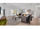 Bright living room with large windows and view of the pool at 13126 Indigo Way, Bradenton, FL 34211