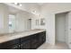 Bathroom boasts double vanity with granite countertop and generous storage at 13789 Old Creek Ct, Parrish, FL 34219
