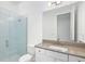 Modern bathroom with glass shower, single vanity, and neutral-toned finishes at 15508 San Lazzaro Avenue, Bradenton, FL 34211