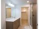 Elegant bathroom with dual sinks and walk-in shower at 1709 N Tamiami Trl # 212, Sarasota, FL 34234