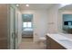 Modern bathroom with walk-in shower and vanity at 1709 N Tamiami Trl # 212, Sarasota, FL 34234