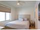 Bedroom with a large bed and neutral decor at 1709 N Tamiami Trl # 212, Sarasota, FL 34234