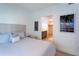 Spacious bedroom with king-size bed and ensuite bathroom at 1709 N Tamiami Trl # 212, Sarasota, FL 34234