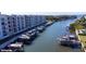 Aerial view of boat docks and waterfront community at 1709 N Tamiami Trl # 212, Sarasota, FL 34234