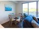 Condo dining area with table and chairs, and water views at 1709 N Tamiami Trl # 212, Sarasota, FL 34234