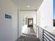 Clean condo hallway with modern finishes and lighting at 1709 N Tamiami Trl # 212, Sarasota, FL 34234