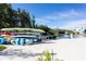 Kayaks and paddleboards are stored on a dockside rack at 1709 N Tamiami Trl # 212, Sarasota, FL 34234