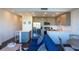 Modern condo kitchen with stainless steel appliances at 1709 N Tamiami Trl # 212, Sarasota, FL 34234