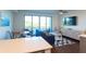 Living room with water views and comfortable seating at 1709 N Tamiami Trl # 212, Sarasota, FL 34234