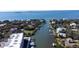 Aerial view of waterfront property and surrounding houses at 1709 N Tamiami Trl # 212, Sarasota, FL 34234