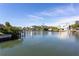 Tranquil waterfront view with boats and luxury homes at 1709 N Tamiami Trl # 212, Sarasota, FL 34234