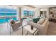 Ocean view lounge with comfortable seating and large windows at 2301 Gulf Of Mexico Dr # 85N, Longboat Key, FL 34228