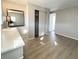 Bedroom featuring a mirrored dresser and sliding closet doors at 3334 Overcup Oak Ter, Sarasota, FL 34237