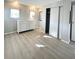 Bedroom with white dresser and sliding door closet at 3334 Overcup Oak Ter, Sarasota, FL 34237