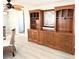 Spacious dining area with built-in hutch and glass-top table at 3334 Overcup Oak Ter, Sarasota, FL 34237