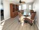 Cozy dining area featuring a wood hutch and wicker chairs at 3334 Overcup Oak Ter, Sarasota, FL 34237